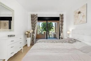 Master bedroom with double bed, exit to the gallery, wardrobe and central heating.