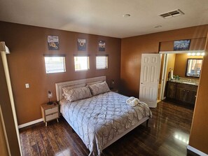 The master's bedroom with a King-size bed.