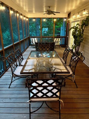 The screened in porch is the perfect place for meals, games and reading.