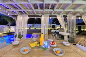 Dine in luxury and style in our beautiful outdoor dining area, overlooking our heated pool, jacuzzi and sauna.