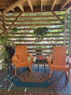 Private deck area at entrance with fountain and bird viewing