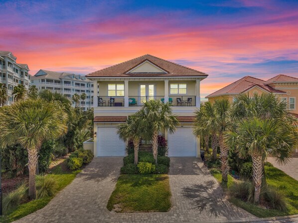 Our magnificent beach house, distinguished by its split garage design.