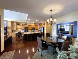 Open concept large living area with living, dining and kitchen