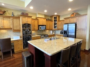 Gourmet kitchen with large island &all the counter appliances you could wish for