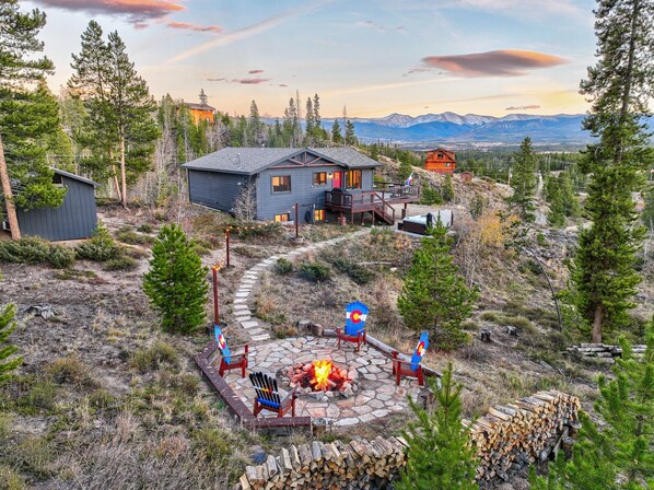 Approximately 1.7 acres of land to enjoy during your stay including Hot Tub, outdoor Firepit, Gas Grill and Gas Firepit Table.  Views from the Continental Divide and Winter Park Ski Resort all the way to Byers Peak