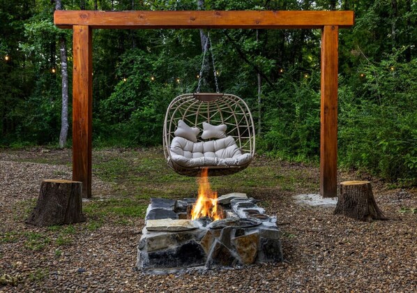 "We really enjoyed this cabin getaway and the amenities were great. The hot tub was very clean and the outdoor swing and fire pit was a great addition." - Kasey