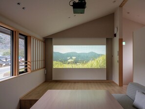 [Main building] Living room/A projector that boldly uses the entire wall
