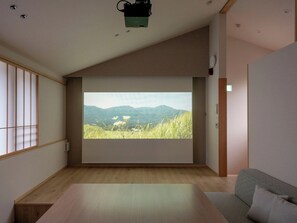 [Main building] Living room/A projector that boldly uses the entire wall