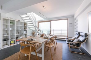 Dining room with access to terrace overlooking the beach