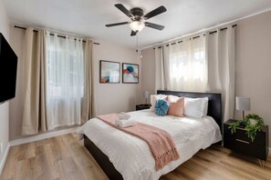 Queen Bed fits 2 people + TV