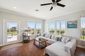 All windows have retractable blinds and the front door leads from the living area to the spacious wrap-around deck.