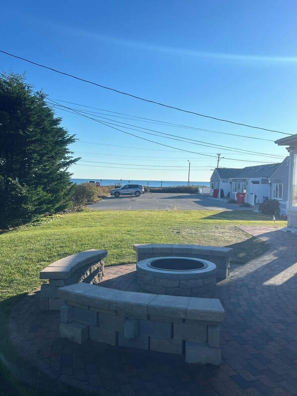 Enjoy the smells and sounds of the ocean by the fire pit