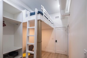 Mezzanine bed upper with lower living area (can put another bed instead)