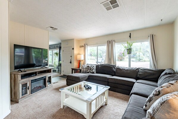 Family room with oversized sectional to relax or watch a movie
