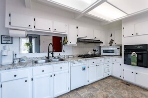 The Kitchen is stocked with all the basics for a great stay.
