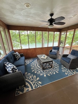 Screened porch off kitchen-Perfect place for your morning coffee & lake view!