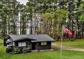 Front of house with Lake O Pines in the background