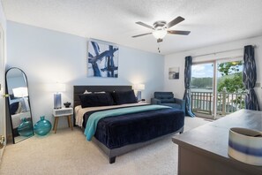 Wake up to the beautiful Lake of the Ozarks sunrise in the master suite, featuring deck access for amazing views from the moment you rise!
