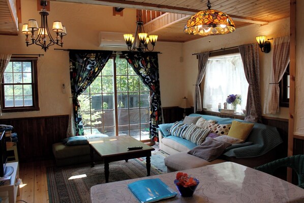 Hollyhock's spacious living room/Blue-purple color, designed with a boy's image. It's a large couch sofa.