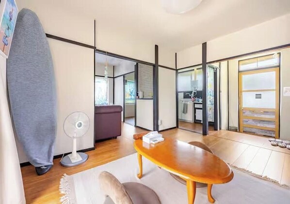 Bright living room with two adjacent rooms