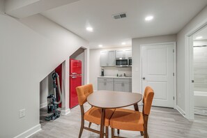 Dining Area | Workstation | Free WiFi | In-Unit Laundry Area