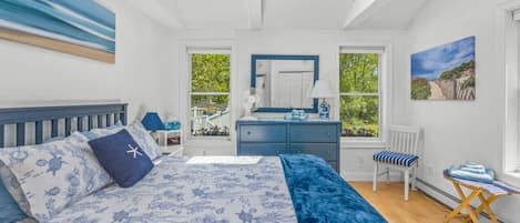 Primary bedroom with a comfortable queen bed and plenty of space to store your clothes.
