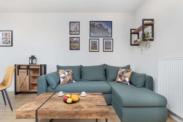 Living room with a double sofa.
