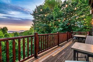 Enjoy breathtaking views of the mountains from the first level balcony.