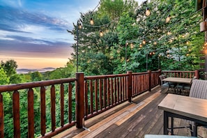 Enjoy breathtaking views of the mountains from the first level balcony.