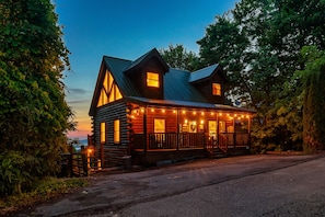 A peaceful sunrise view from the front of the cabin.