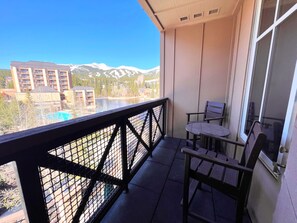 Balcony views of Breck Resort mountains and Maggie Pond 