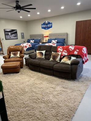 Smart TV with comfy sofa and chair