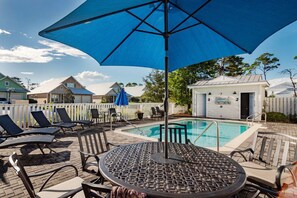 Community pool is right behind the home