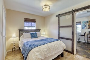 Queen sized bed in separate bedroom