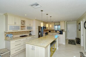 Kitchen Area - Beautiful, updated kitchen with large item and extra seating.