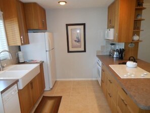 Kitchen - Fully equipped kitchen with a farm sink and plenty of counter space.