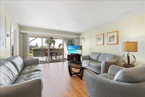 Living Area - Open the lanai doors and feel the breeze of of the Gulf