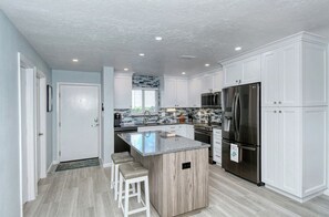 Kitchen Island - Large kitchen island with extra seating.