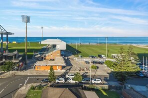 From the shared rooftop terrace, take in views over WIN Stadium and the bright blue ocean.
