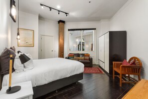 Elegant king bedroom with modern design, perfect for a restful night after a long day.