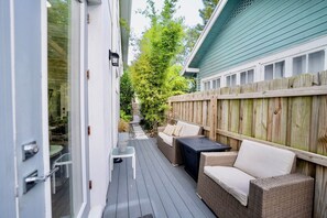 The bench is strategically positioned to offer a great view of the entire space, allowing you to feel connected to the environment and the people around you.