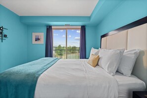 Second bedroom with a queen bed, private patio & closet
