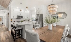 The eat in kitchen has seating for 6 at the dining table.