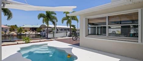 Gorgeous heated pool overlooking canal