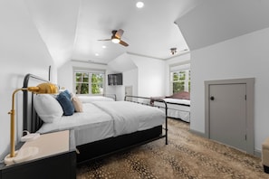 Upper Level bonus room with two king beds and a twin bed with trundle & ensuite bathroom. 