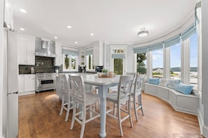 Fully stocked kitchen with large island seating for 6. 