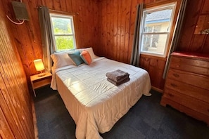 Bedroom one has a queen bed