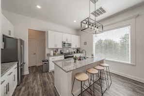 Kitchen with bar seating at the island