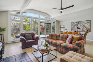 Spacious and Cozy Living Room with Fireplace