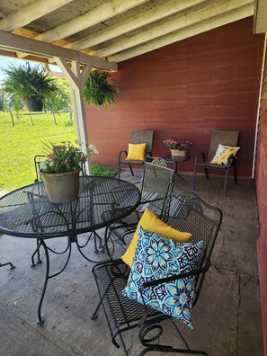 Shaded patio to enjoy the sounds of nature or a meal from the grill.